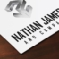 Nathan James and Company Logo Mocked up on paper on wood desk